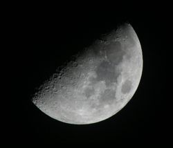 Most amateur astronomers start with observing the moon This image was taken with a Canon Digital Rebel XT attached to a lens with an 800mm focal length at 1/125th of a second.