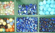 different glass marbles from a glass-mill