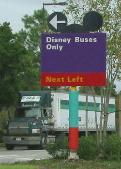 A typical style of sign in Walt Disney World, showing one of many uses by Disney of the Mickey ears logo.