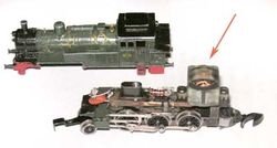The sugar-cube sized electric motor in a Z scale model locomotive. The entire engine is only 50 mm (2") long.