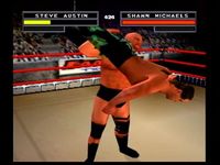 Steve Austin body slams Shawn Michaels.