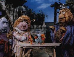 The Gorgs, from left to right: The King and Queen of the Universe and Junior. On the table in the center are several Fraggles.