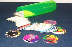 A collection of pogs and a typical pog case.