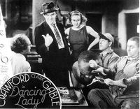 The boys with Ted Healy in the 1933 film, Dancing Lady. Joan Crawford looks on.